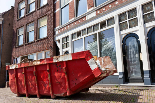 red skip for dumping renovation waste in a street in rotterdam